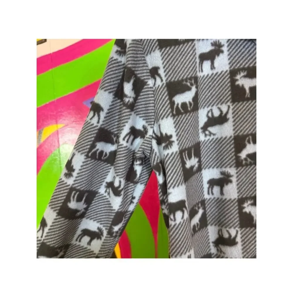 Komar Kids, Black and Blue Animal Print Button Up Pajama Top. Size XL(14-16)